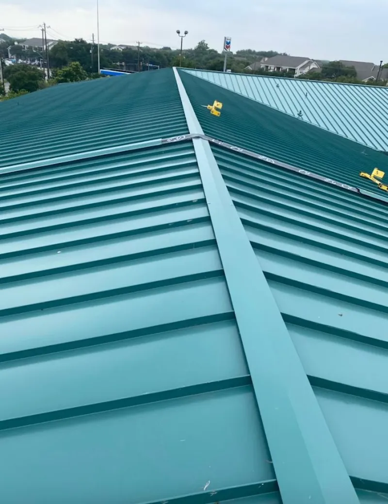 Green commercial metal roof ridge and valley for Metal Roof Repair in Mayflower Village