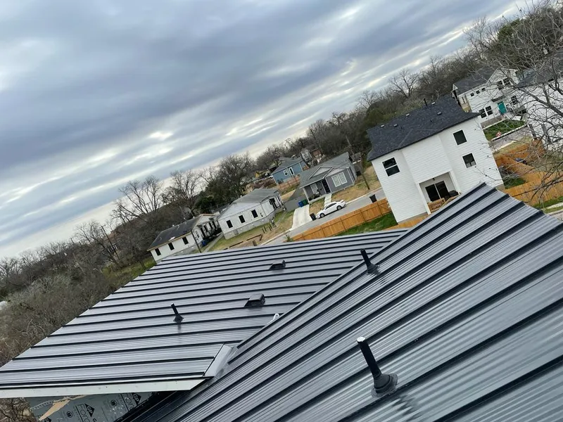 Standing seam metal roof panels with vents for Skylight Repair in Mayflower Village